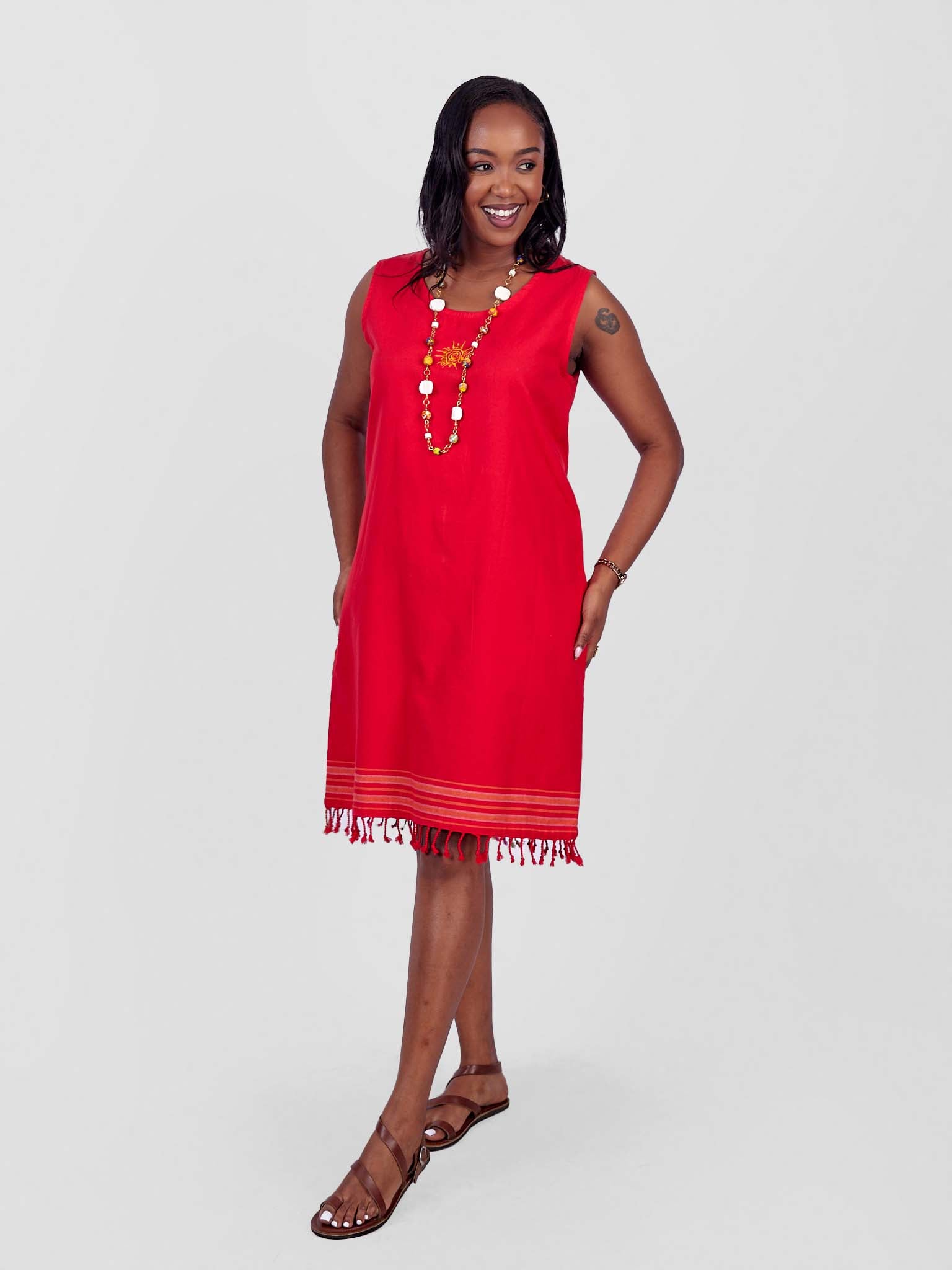 kikoy dress designs The Kavoo Kikoy Dress (Red) is here! , A bold blend of half striped kikoy and half red cotton fabric fun, unique and yes it has pockets!!! , Effortless style with comfort and character ,