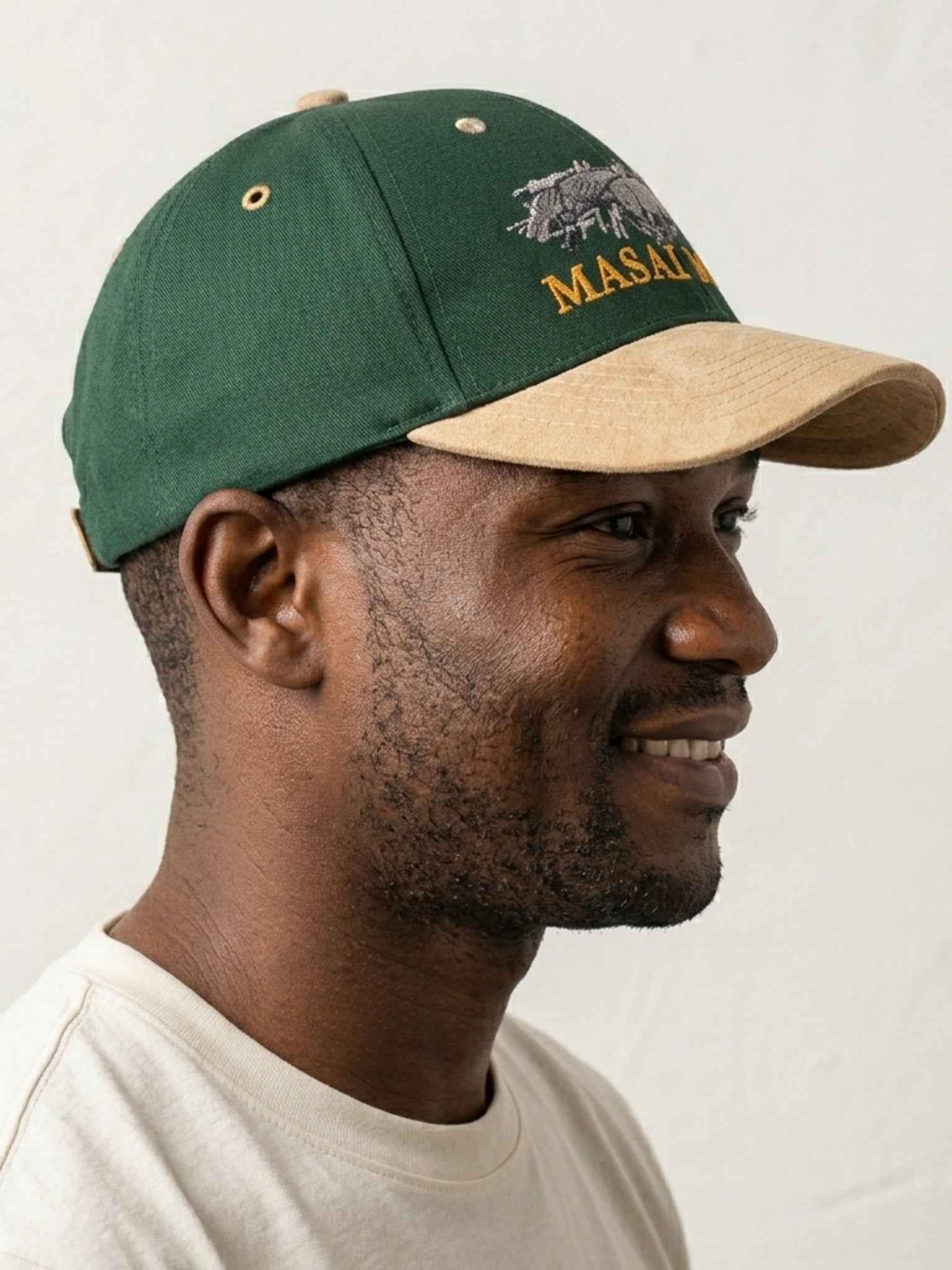 Masai Mara Wildebeest Cap - Embroidered Leather Peak Cap