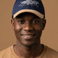 Running Zebras Leather Peak Cap - Embroidered Quality Headwear