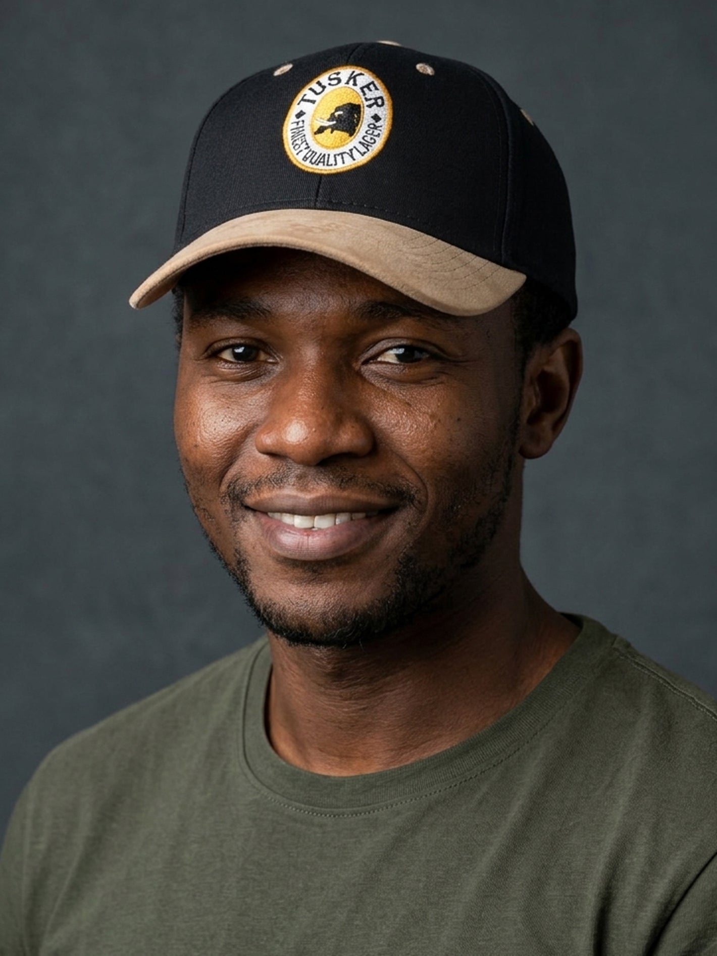 Tusker Embroidered Leather Peak Hat for Stylish Outdoor Adventures